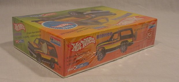 Hot Wheels Snap-Tite Bronco model kit box with orange, yellow, and green graphics