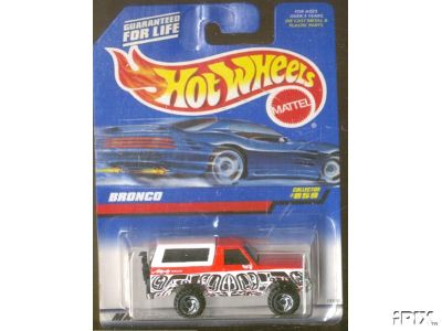 1979 Ford Bronco - A Hot Wheels toy Bronco is displayed in its original packaging, a graphic of a sports car.