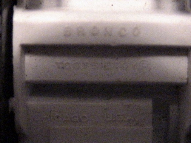 Bronco emblem and VIN plate on a vehicle part