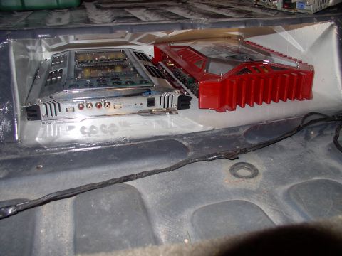 1986 Ford Bronco - Here's their new home. Under the floor beneath the back seat entirely concealed by the rear carpet which hangs down over the opening and tu…