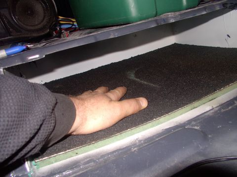 1986 Ford Bronco - This has rubberized top coating and a half inch of insulation underneath and should stop the amps from sliding around.