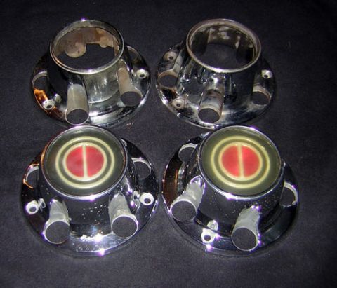 1995 Ford Bronco - Set of four chrome hubcaps, two with center emblems and two without.