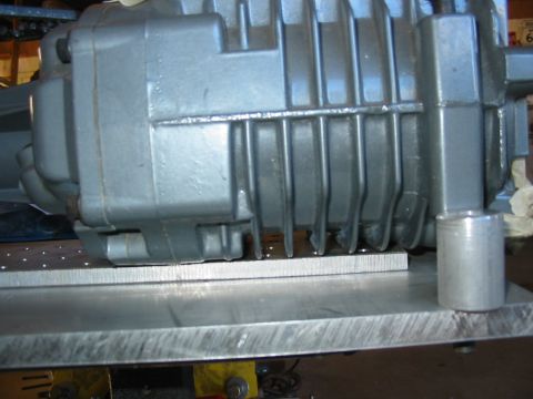 1993 Ford Taurus - Supercharger component shown up close, resting on a metal plate.