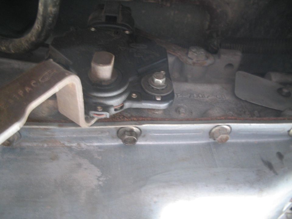 close-up of transmission shift linkage and pan