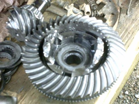 1995 Ford Bronco - Close-up of damaged differential gears, indicating mechanical failure.
