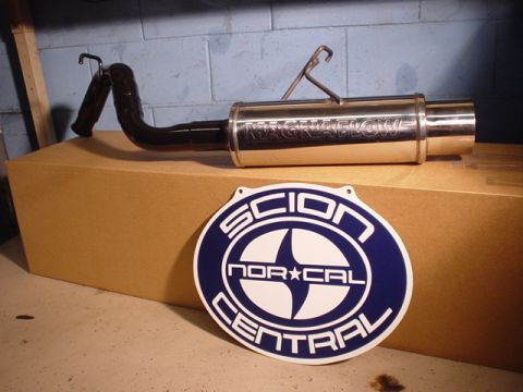 1993 Ford Taurus - A Magnaflow exhaust muffler and a Scion NorCal Central sign are displayed on a cardboard box.