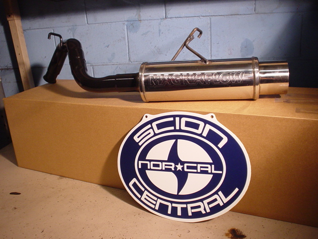 Magnaflow muffler and Scion NorCal Central sign on a cardboard box