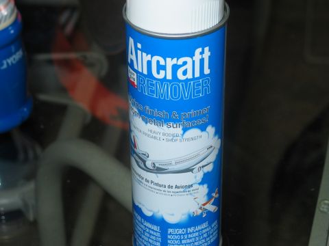 1995 Ford Bronco - A can of aircraft remover is shown with text and images of airplanes.