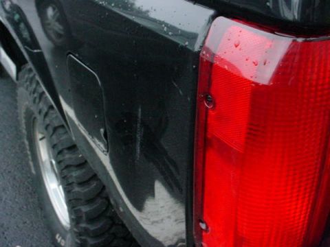 1995 Ford Bronco - The biggest dent on the rear quater panel.
