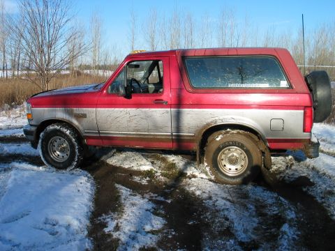 1995 Ford Bronco - This 1995 Ford Bronco is stuck in a muddy, snowy area off-road.