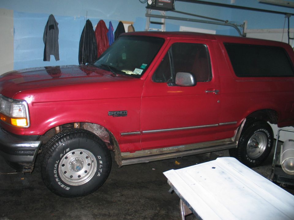 Red 1995 Ford Bronco side view