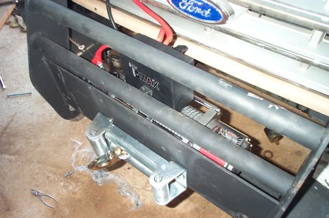 1987 Ford Bronco - Ford Bronco front bumper assembly with winch installed.