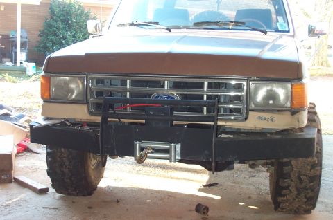 1987 Ford Bronco - This Ford Bronco has a custom front bumper with a winch installed.