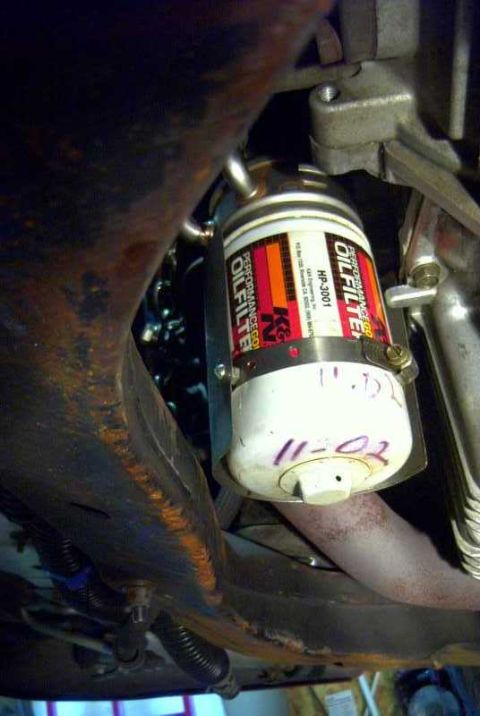 1997 Ford Taurus - A heat shield for the filter made from SS and a hose clamp. It is off set with some small nuts so there is no contact.
