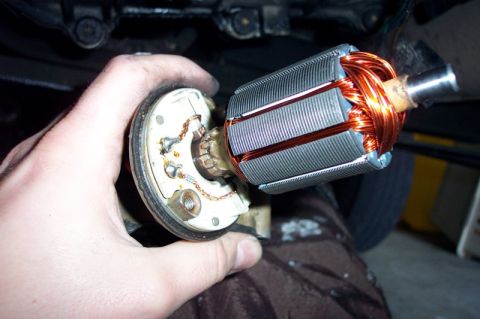 1992 Ford Bronco - Here's the motor with the cap and housing removed. When you pull this part out, the brushes and springs will pop out. Just be sure not to l…