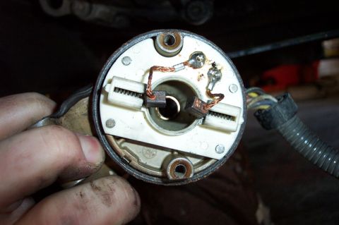 1992 Ford Bronco - Here are the brushes and springs I was talking about. When reinstalling the motor, keep these pushed in with a pick or small screwdriver, t…