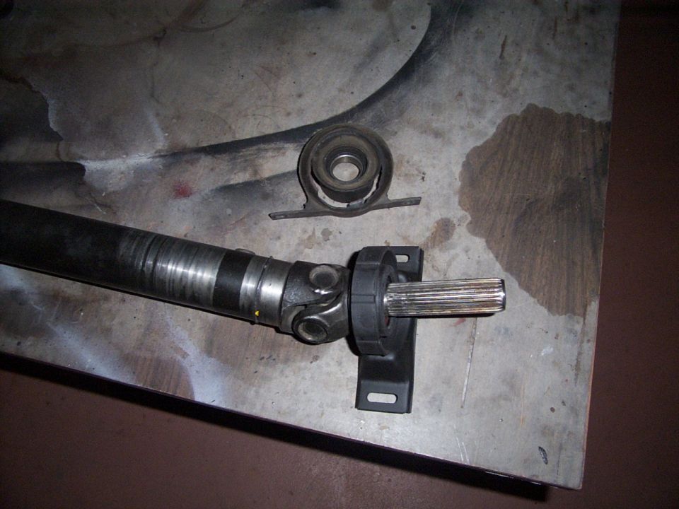 Driveshaft and center support bearing on a workbench