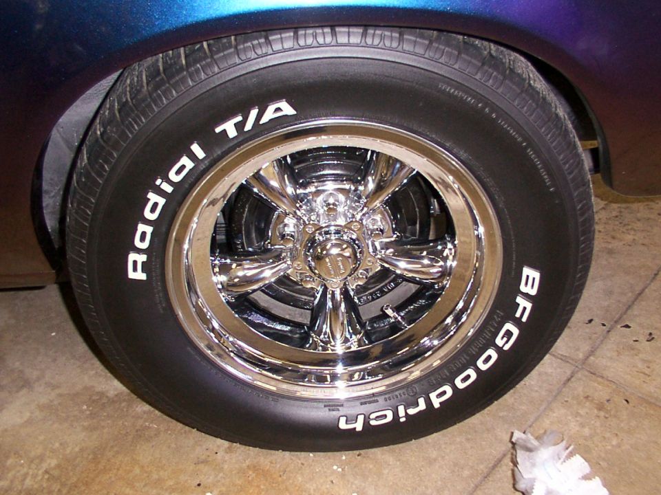 BFGoodrich Radial T/A tire on a chrome 5-spoke wheel