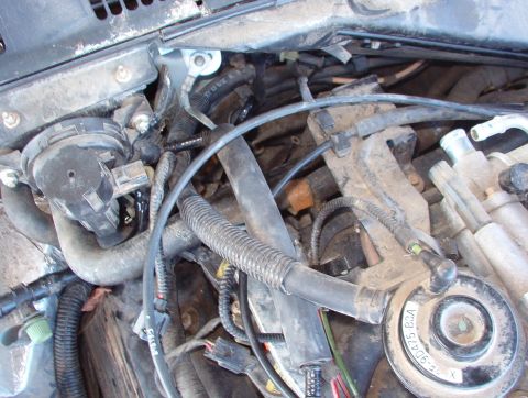 1994 Ford Crown Victoria - Engine bay components and wiring are visible in this close-up photo.