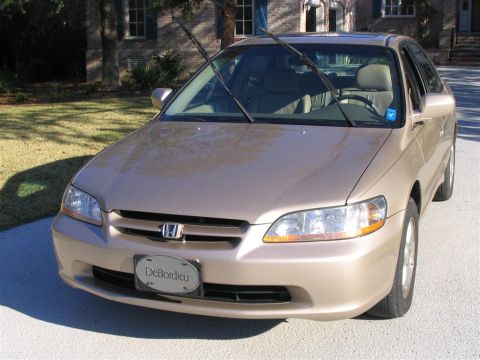 2000 Honda Accord - This tan Honda Accord sedan appears to be from the 1998 model year, not 2000 as claimed.