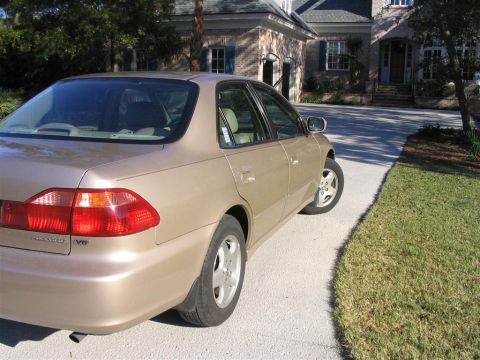 2000 Honda Accord - Rear quarter view of a tan 2000 Honda Accord sedan parked on a driveway.