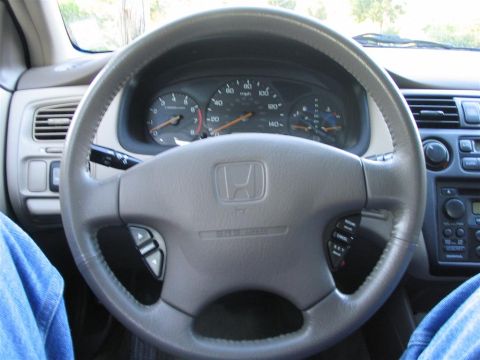 2000 Honda Accord - Interior view of a 2000 Honda Accord, focusing on the steering wheel and instrument panel.