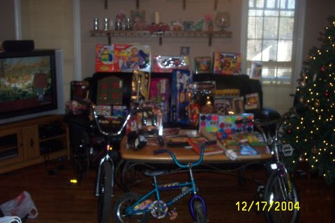 1979 Ford F-150 - A living room is decorated for Christmas, with a tree, presents, and bicycles visible, dated December 17, 2004.