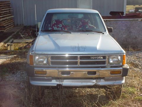 1988 Toyota 4Runner - Front view of a silver 1988 Toyota 4Runner parked outdoors.