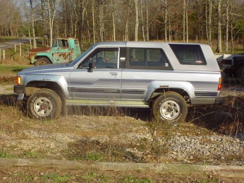 1988 Toyota 4Runner - This 1988 Toyota 4Runner is seen in a rural setting with a second, older truck in the background.