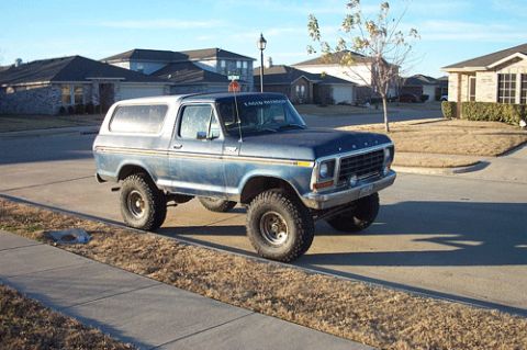 1978 Ford Bronco - This 1978 Ford Bronco features a lift kit installed, as indicated by the text on the door.