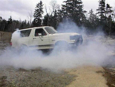 1988 Ford Bronco - Smoke Show with 33x12.5 MTs on there!