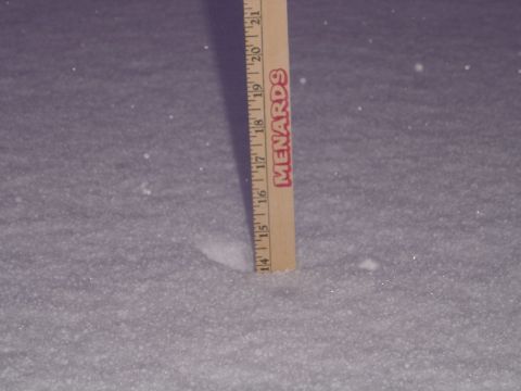 1978 Ford Bronco - A ruler measures snow depth, indicating about 14.5 inches of accumulation.