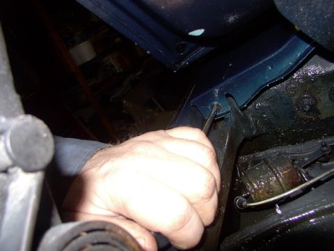 1986 Ford Bronco - Then remove the almost dozen screws along the front of the cowl under the hood.