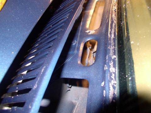 1986 Ford Bronco - Now you can lift and tip the cowl far enough forward out of the way to get access to the 3/8" bolt at the back of the motor.