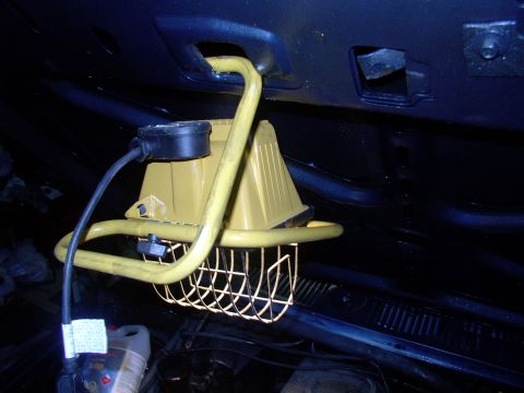 1986 Ford Bronco - Perhaps the ultimate trouble light ! Noticed that the 500 watt flood hooked nicely into the hood hole near the latch catch. Plenty of light…