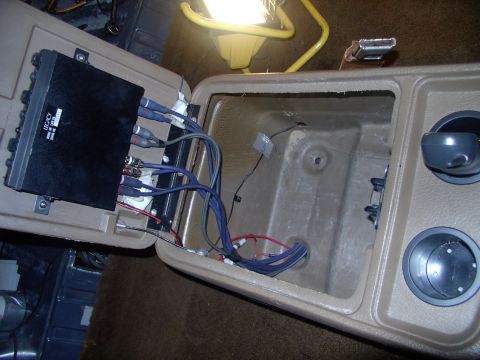 1986 Ford Bronco - Next the seat belt anchors go down and the center console gets put in. It's so nice to get the amplifiers under the floor and get my consol…