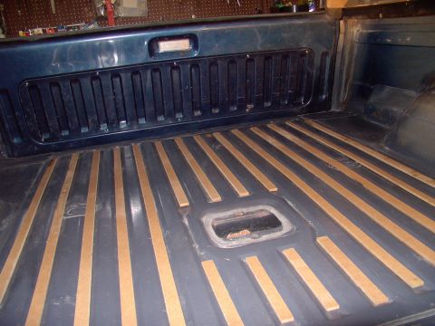 1986 Ford Bronco - They fit beautifully. In spite of all the abuse I'd given the truck, when I lifted the rugs every single slat was right where I'd laid them.