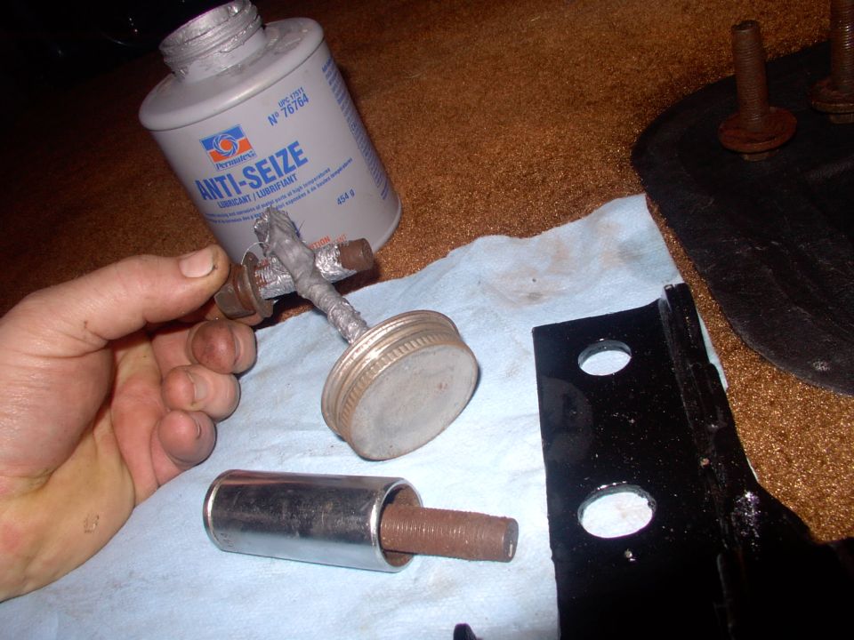 Having personally had to extract a broken rear seat bolt, everything I install on the body gets anti-seize or synthetic grease in the threads.