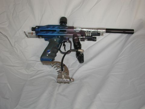 1985 Ford Bronco - Paintball marker with custom flame graphics and chrome barrel.