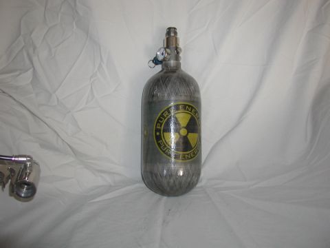 1985 Ford Bronco - Air tank with radiation symbol and 'PURE ENERGY' text is shown against a white cloth background.