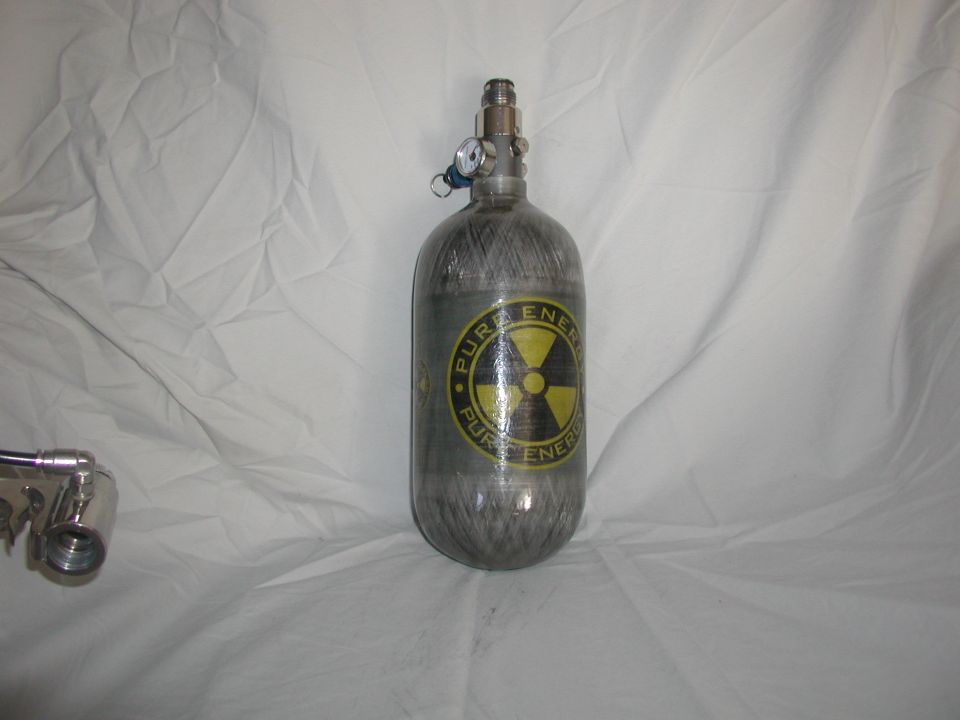 Gray air tank with yellow radiation symbol and 'PURE ENERGY' text, attached to a chrome fitting