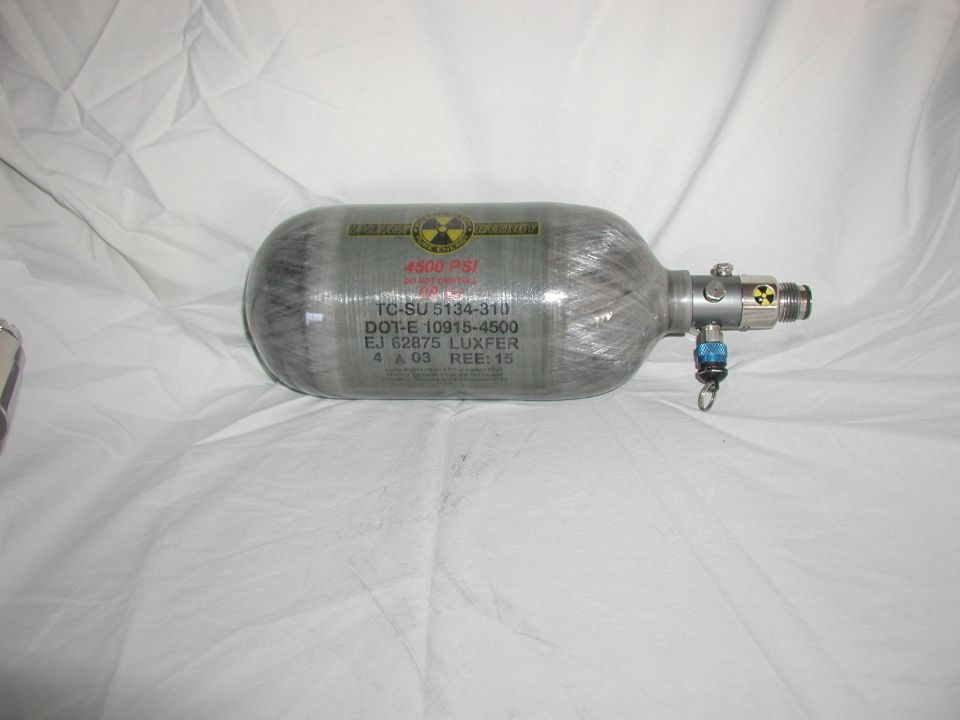 Compressed gas cylinder with 4500 PSI marking and radiation symbol