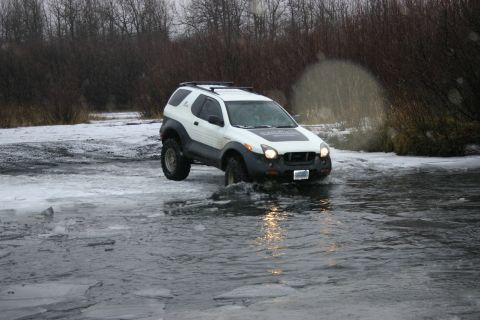 2003 Jeep TJ - Isuzu VehiCROSS navigates icy water, showing off its off-road capabilities.
