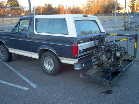 1994 Ford Crown Victoria - The 2000 Grand Marquis 4.6L that will be going into my '94 CV strapped to my hitch hauler behind my brother-in-law's '93 EB Bronco. Yeah, i…