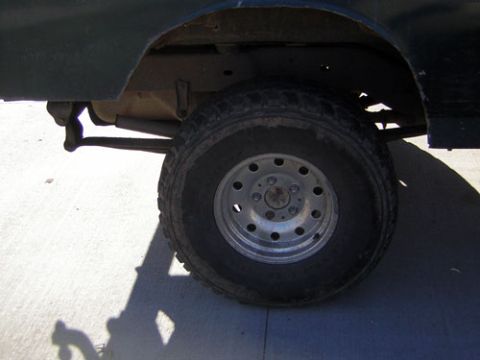 1995 Ford Bronco - Rear wheel and suspension of a 1995 Ford Bronco.