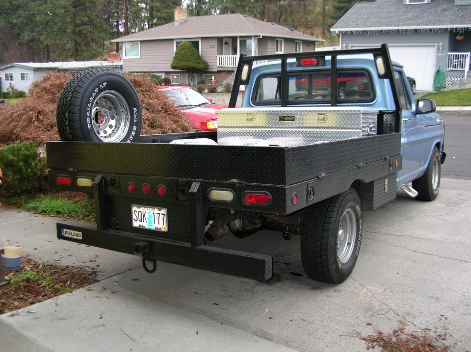 1968 Ford F-100 flatbed truck, rear view, blue