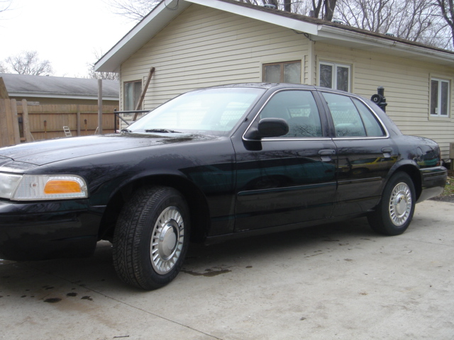 Black 1998 Ford Crown Victoria sedan, 3q front view