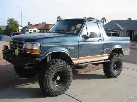 1994 Ford Bronco - This lifted 1994 Ford Bronco features aggressive off-road tires and a custom bumper.