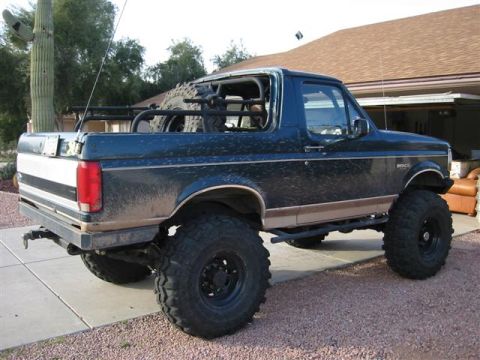 1994 Ford Bronco - This 1994 Ford Bronco has been heavily modified with large off-road tires and a custom roll cage.