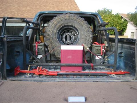 1994 Ford Bronco - Rear interior view of a 1994 Ford Bronco with off-road equipment.